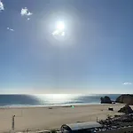Aconchegante, Da Rocha Портиман